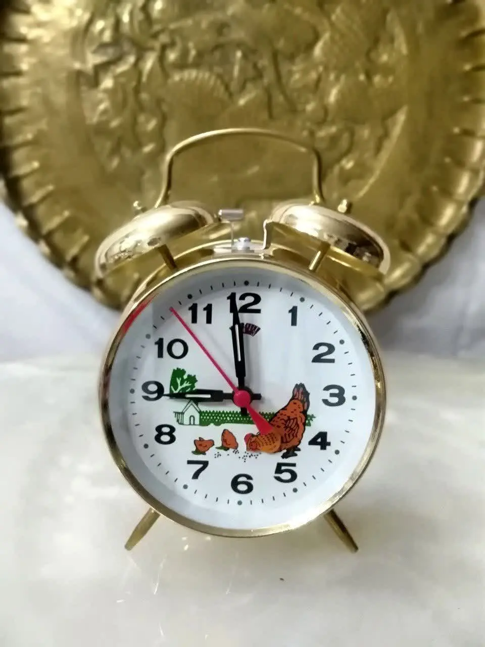 ساعت رومیزی کو کی مرغی حرکت...