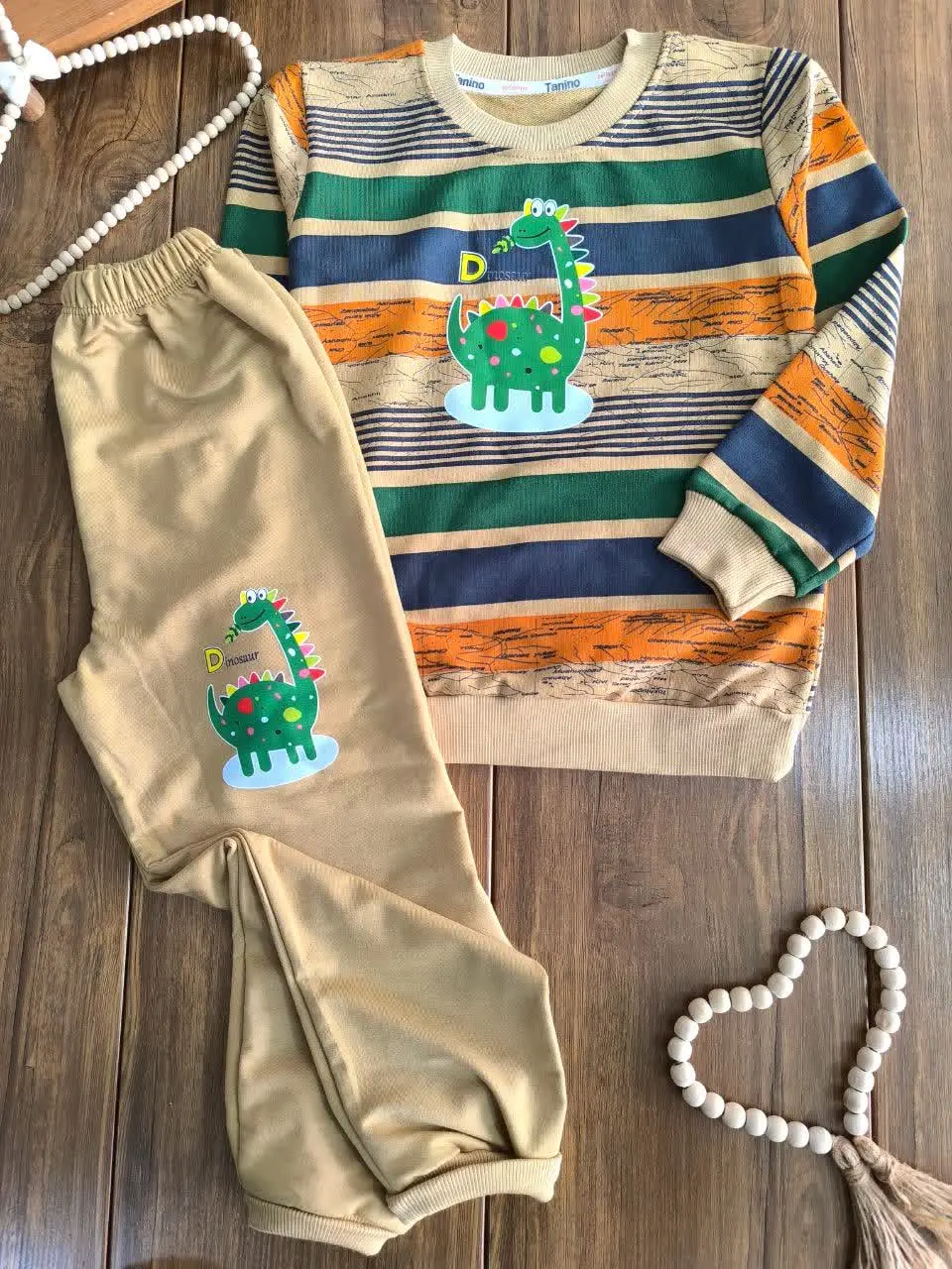 لباس بچه گانه دایناسور شکمو
