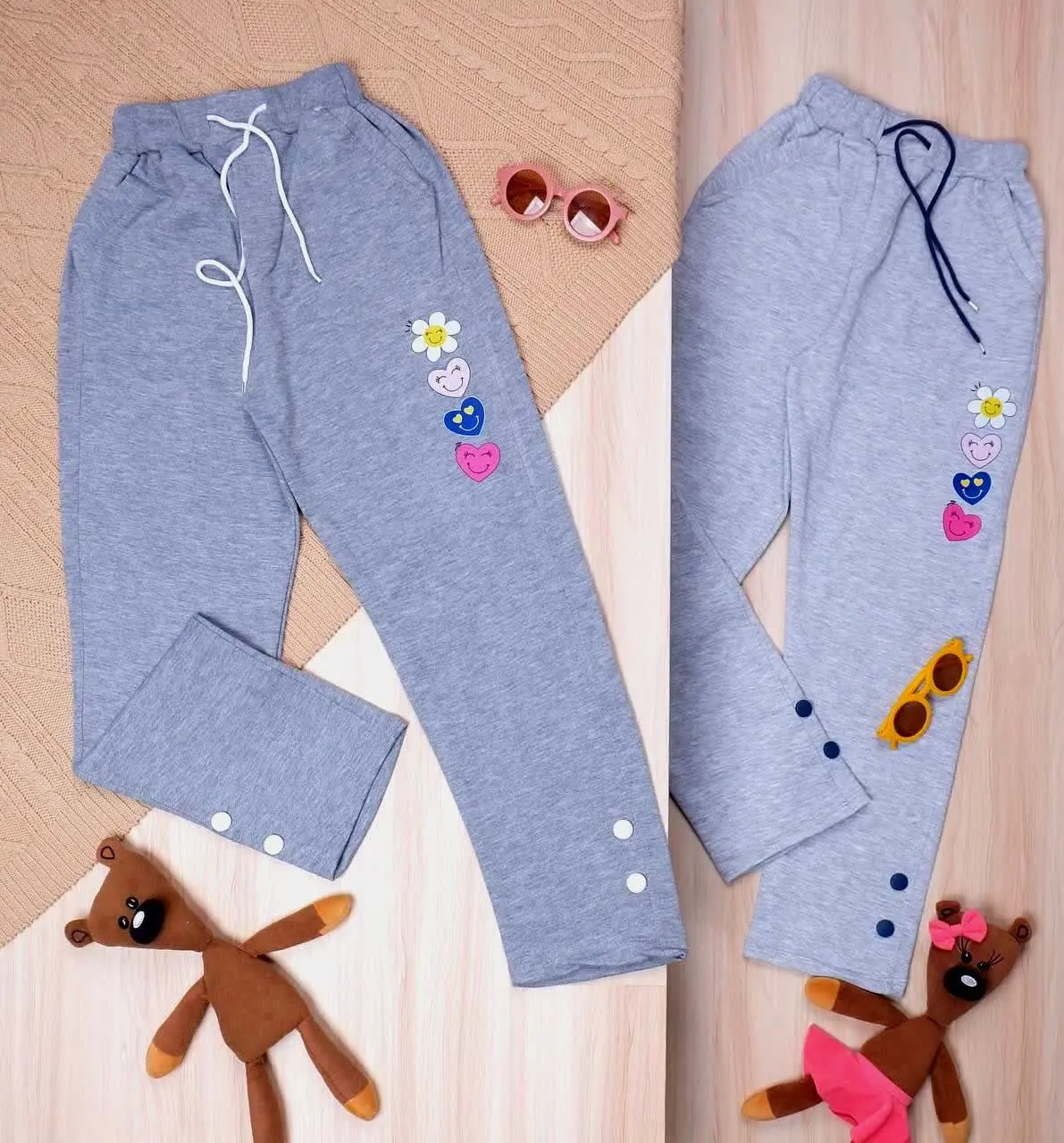 👫شلوار دخترانه ملانژ دکمه دار قلب و گل👫
