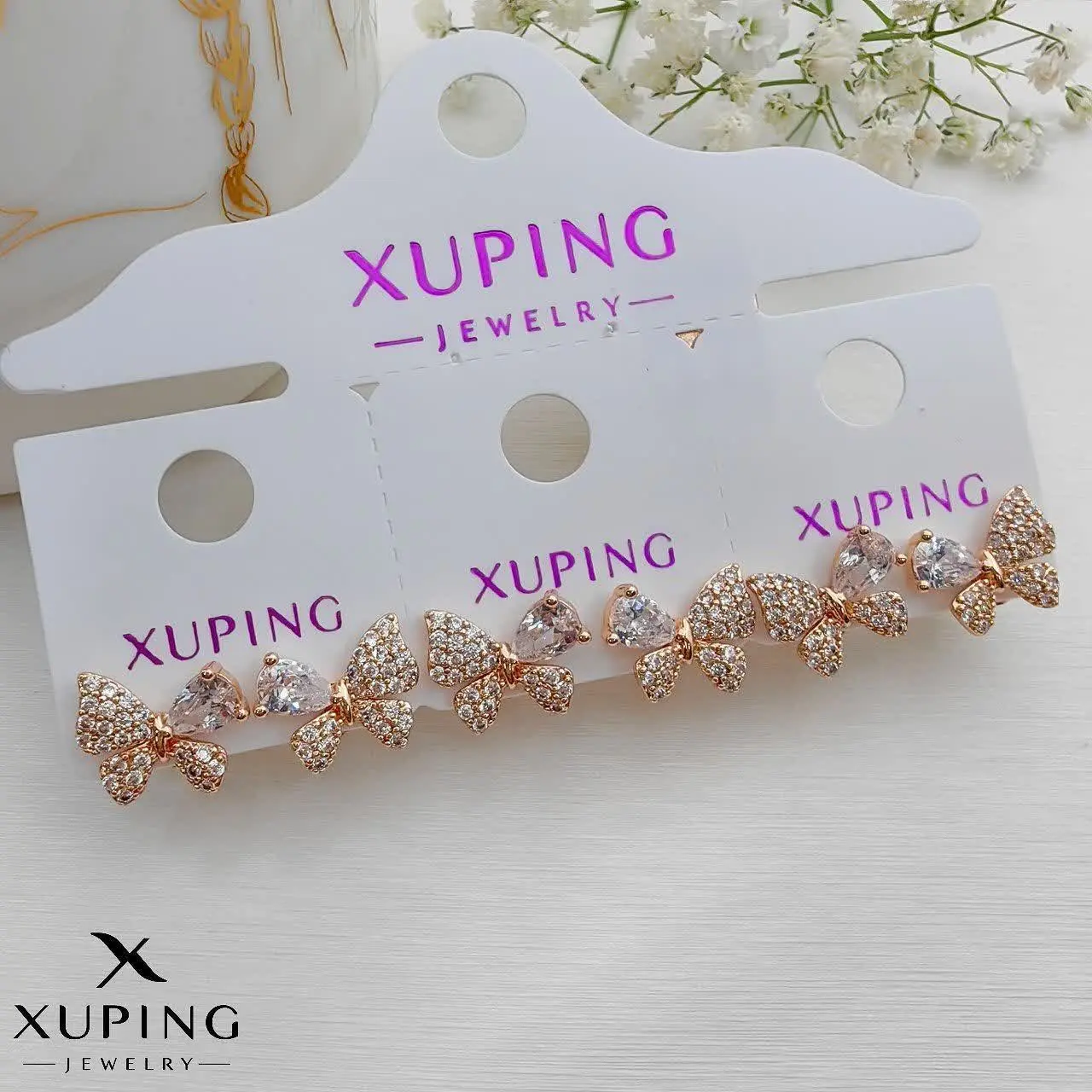 #گوشواره پروانه‌ای ژوپینگ کد ۱۹۹۳
