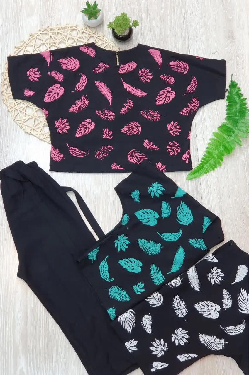👗کراپ شلوار مشکی طرح پر

