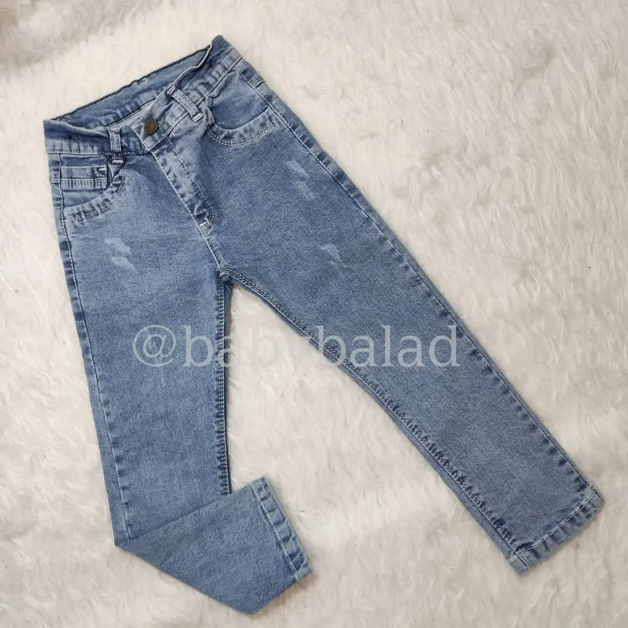 شلوار جین کمری با کش تنظیم
