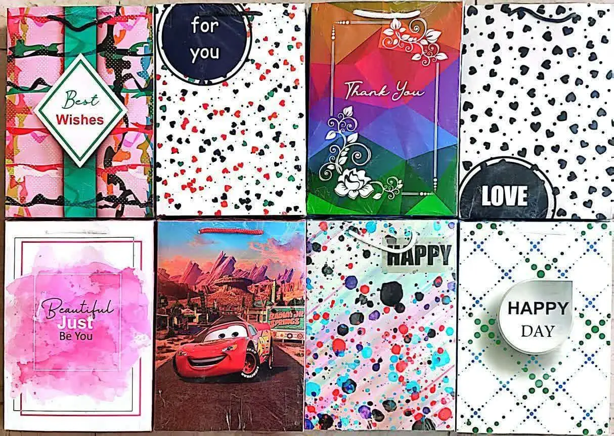 پاکت کادو دسته دار اعلا سایز ۳ کفه پهن در طرح‌های متنوع و پر فروش 
