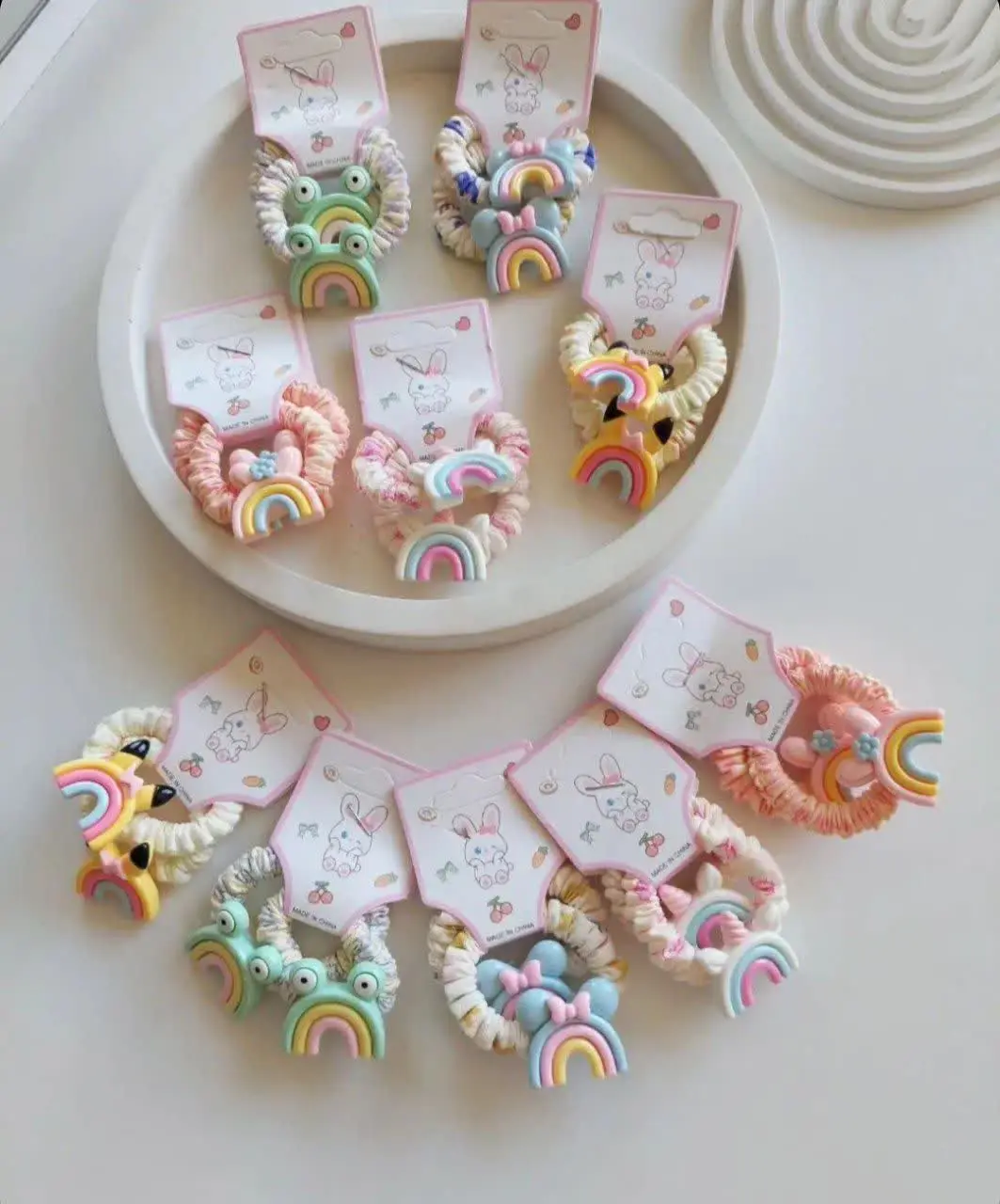 کش مو ۲تایی رنگین کمان پارچه‌ای
