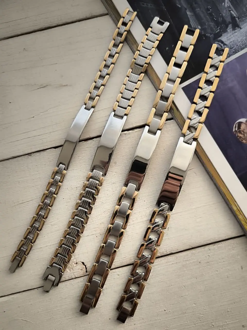 دستبند مردانه دورنگ پلاک دا...