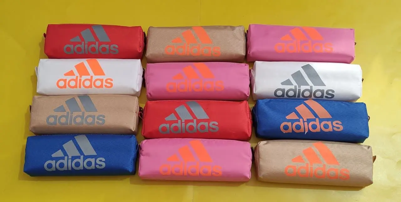 جامدادی تک زیپ بزرگ اسفنج دار در رنگ‌ها و طرح‌های متنوع 
