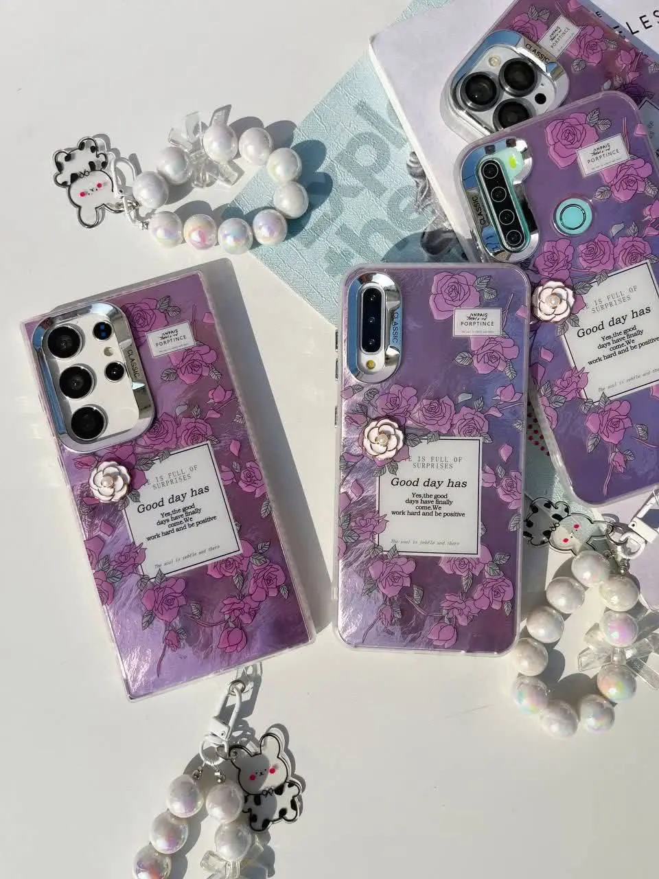 📱مدل قاب: قاب ماربل گل بنفش لنز باز و دور لنز فلزی گل برجسته طرح زمینه ماربل
