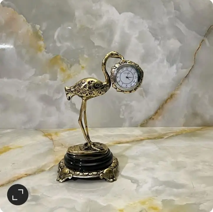 ساعت رومیزی فلامینگو تمام برنزی پایه سنگی شیک وچشمنواز 

