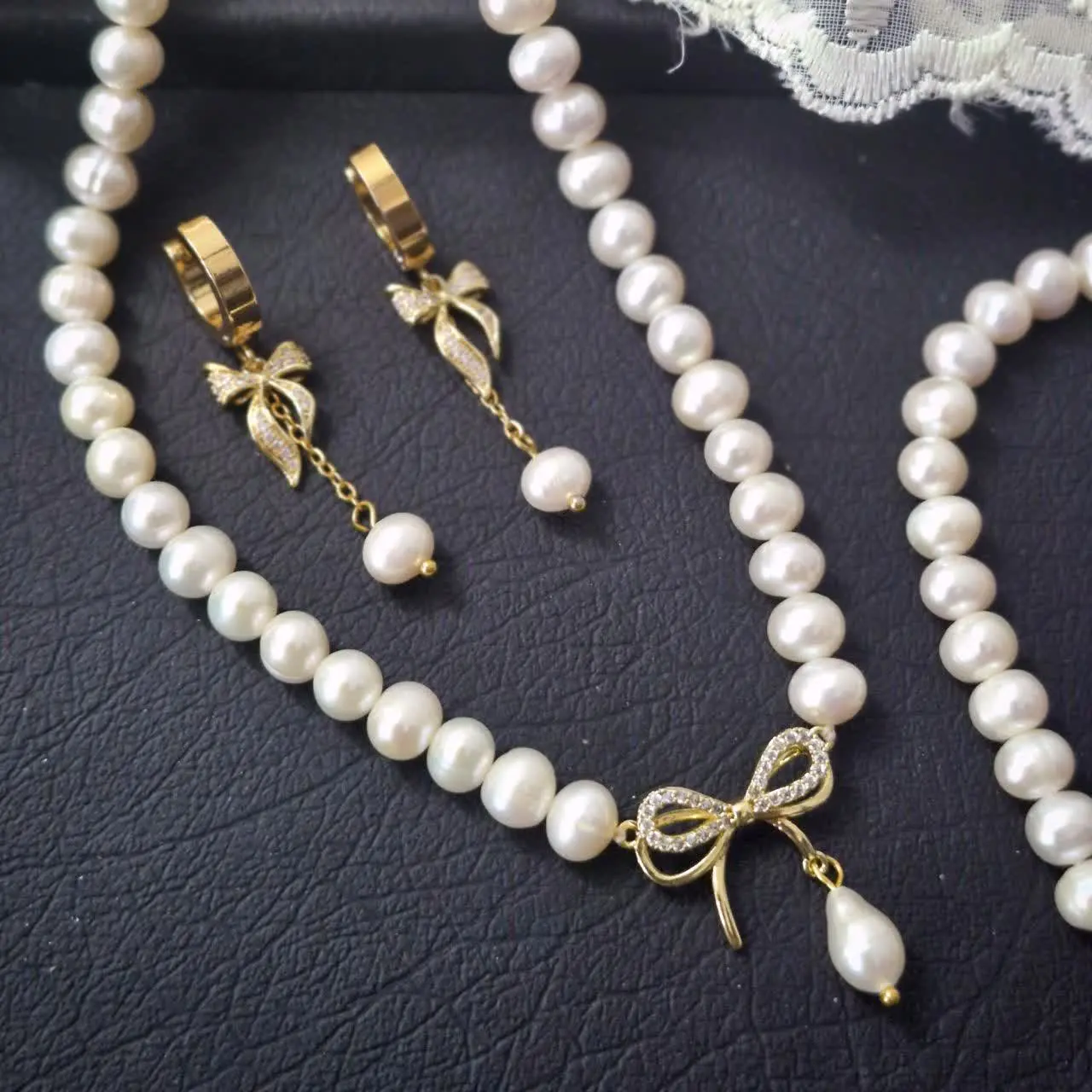 گوشواره آویز پاپیون و مروارید