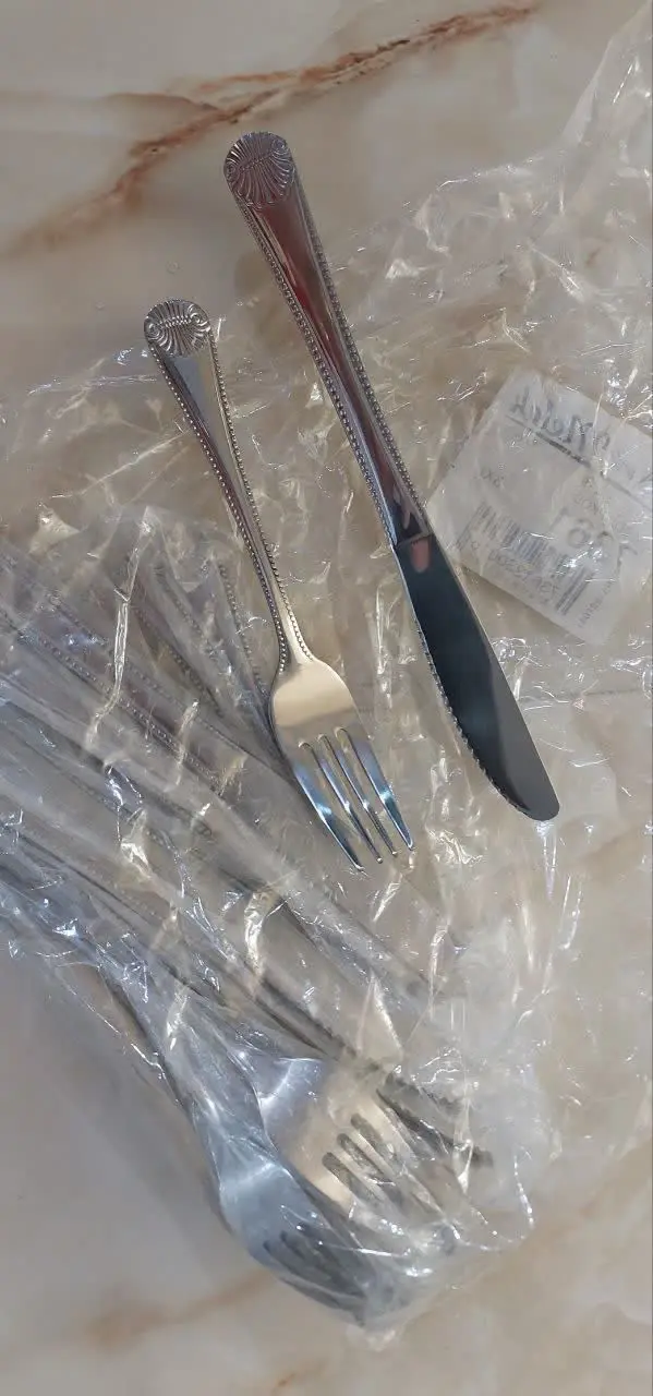 دو دست کارد و جنگال میوه خو...