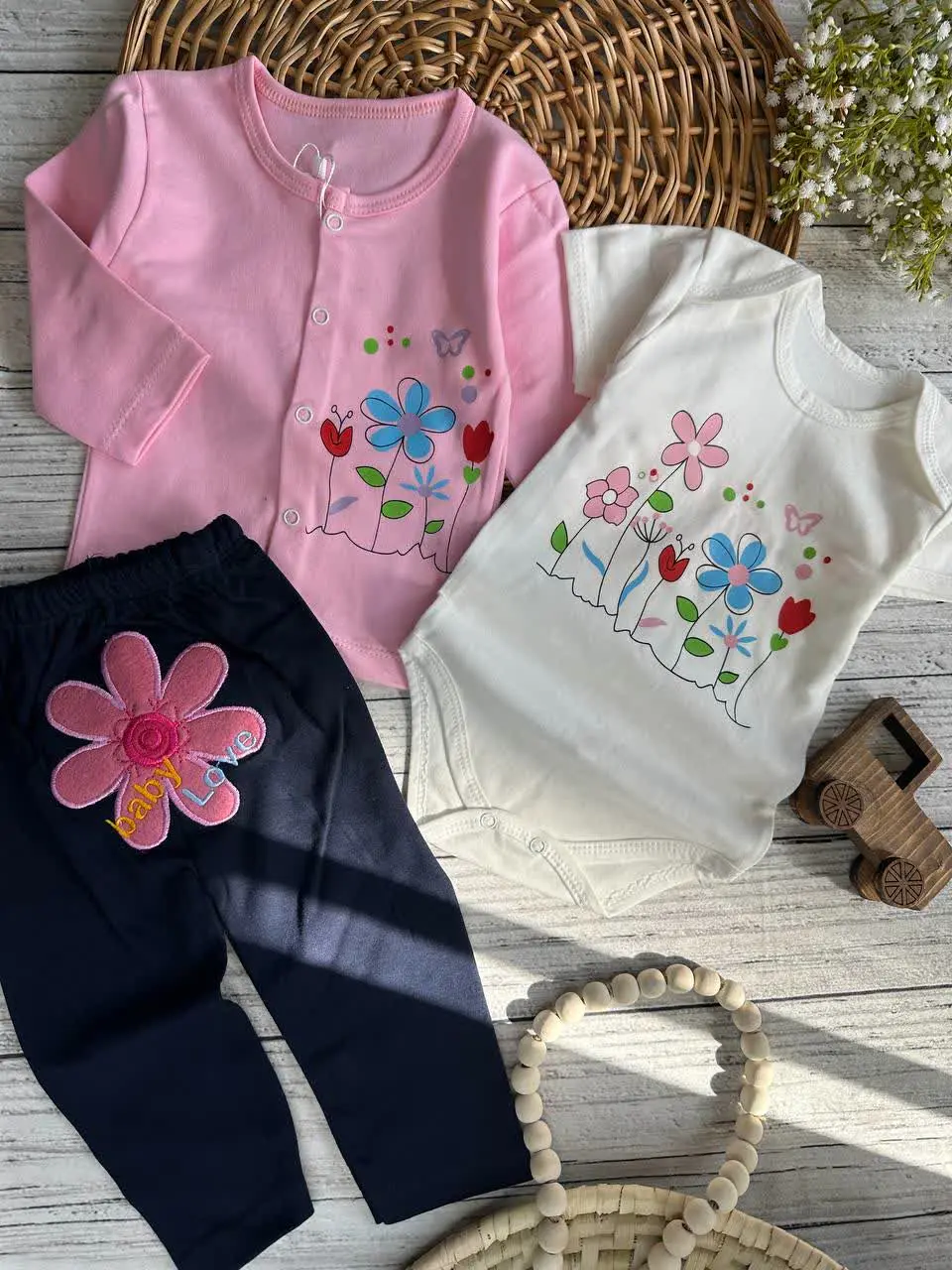 سه تکه طرح گل‌ها صورتی نوزادی و کودک کد ۱۱۷۲۶۱ 
