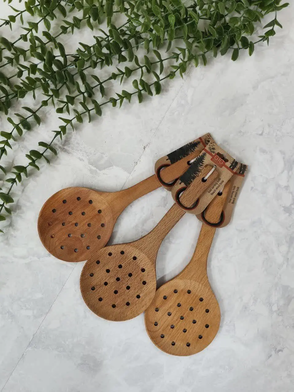 کفگیر چوبی سوراخ دار
