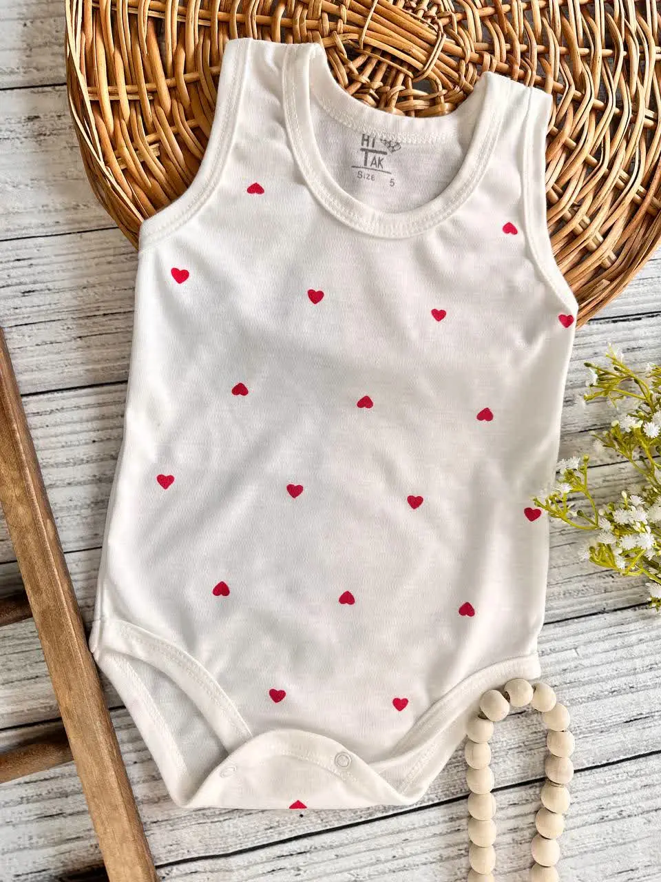 بادی زیردکمه سفید طرح تمام چاپ قلبی نوزادی و کودک کد ۱۱۸۰۷۹ 
