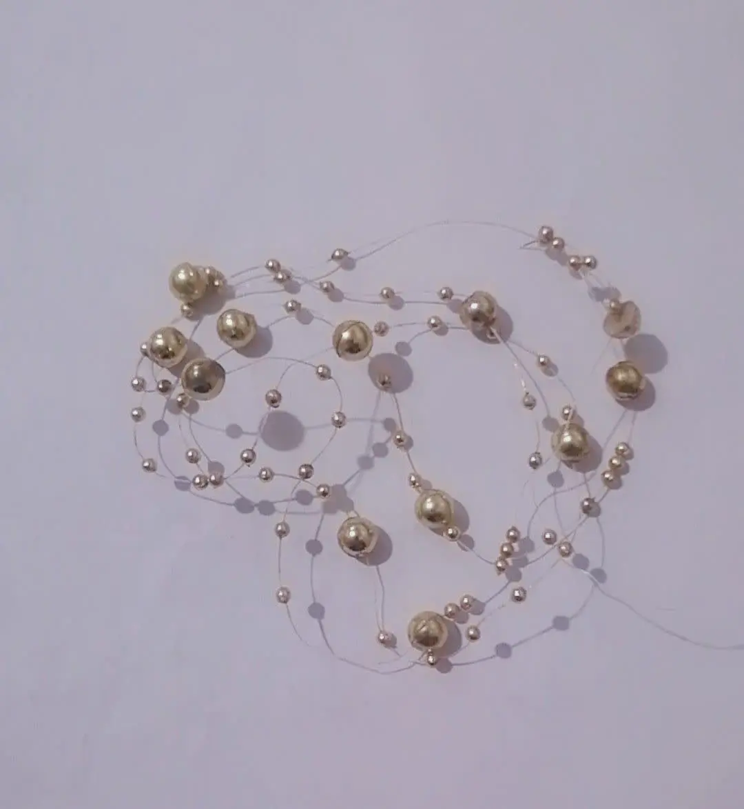 رنگ: طلایی با نخ نامرئی
