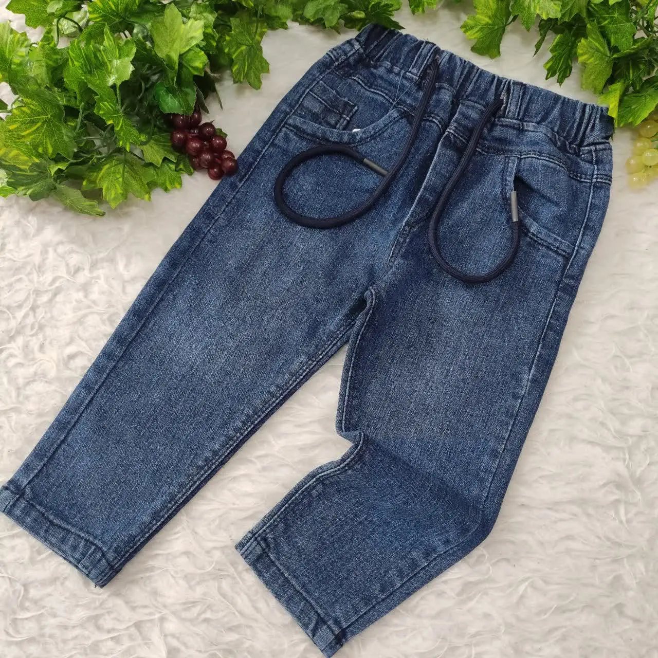 شلوار جین مام فیت سورمه‌ای دخترانه و پسرانه
