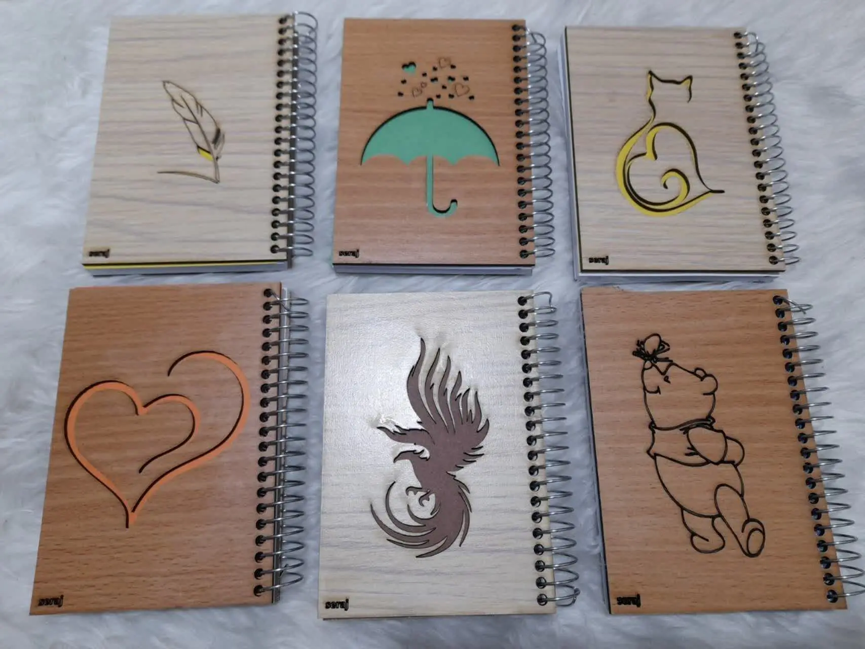 🎗#عنوان: دفترچه چوبی 
