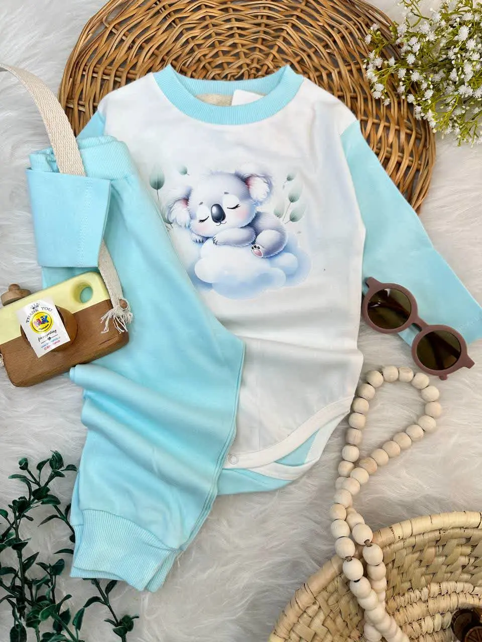 بادی شلوار طرح کوالا فیروزه‌ای نوزادی و کودک کد ۱۱۸۰۶۸ 
