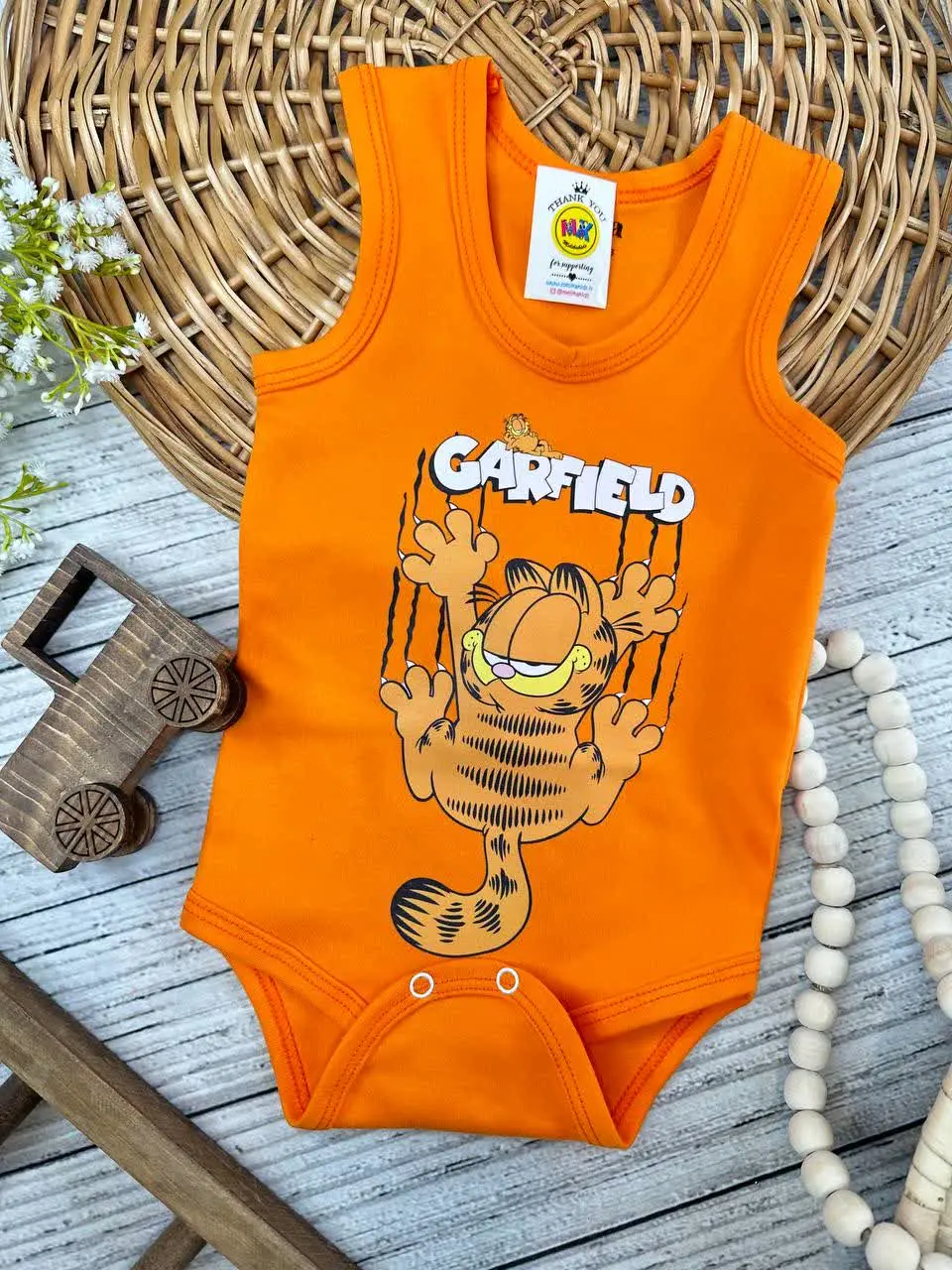 بادی زیردکمه طرح گارفیلد نارنجی نوزادی و کودک کد ۱۱۸۰۸۳ 
