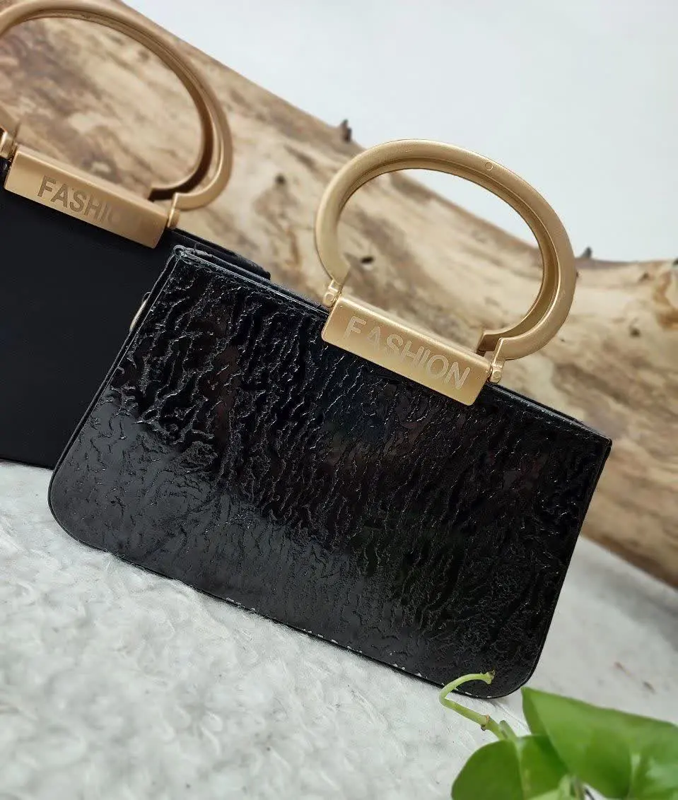  نام: 👛 کیف مجلسی مدل فشن طلایی ورنی 😍
