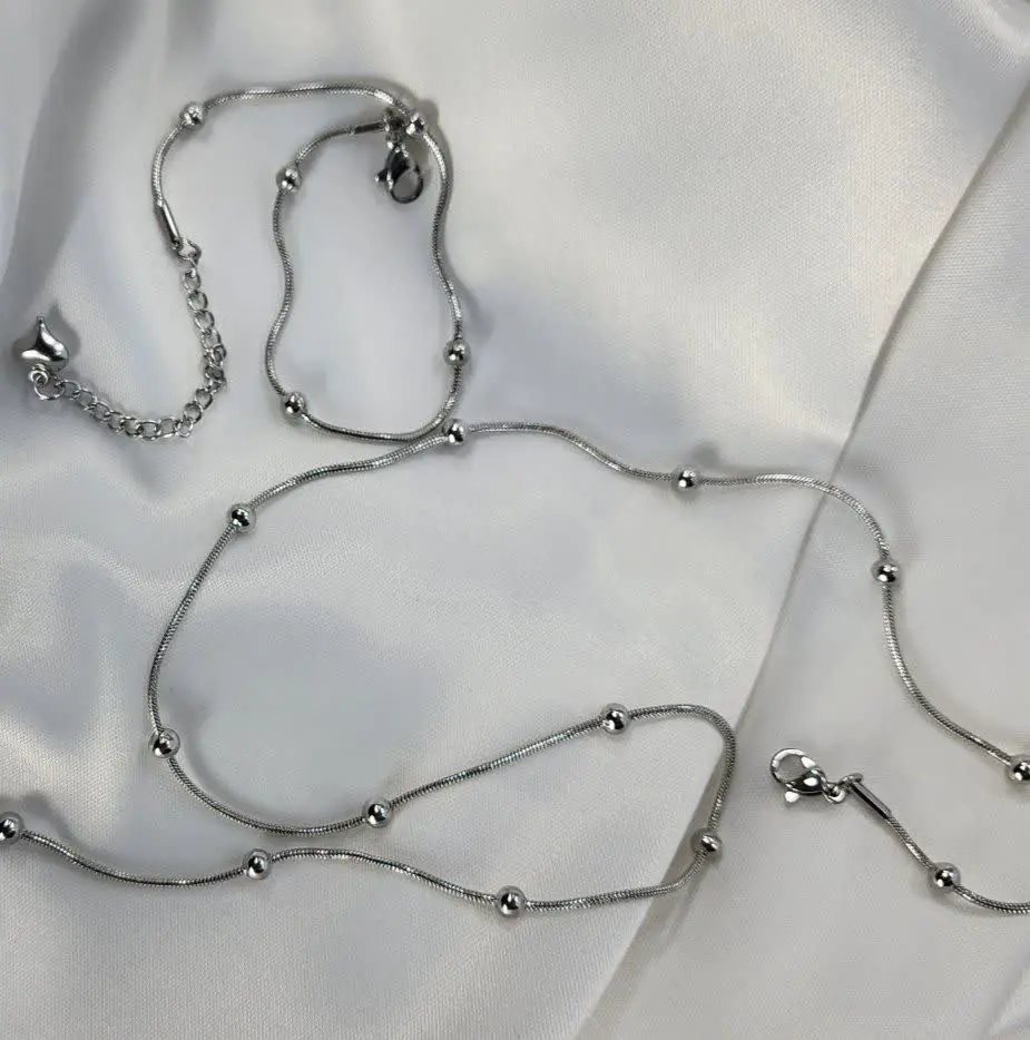 👚 نام: گردبند توپی زنجیر ماری
