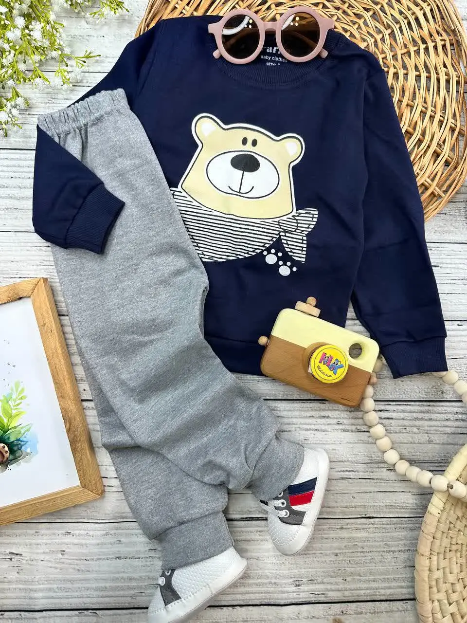 بلوز شلوار طرح کله خرس سورمه‌ای نوزادی و کودک کد ۱۷۳۱۸۹ 
