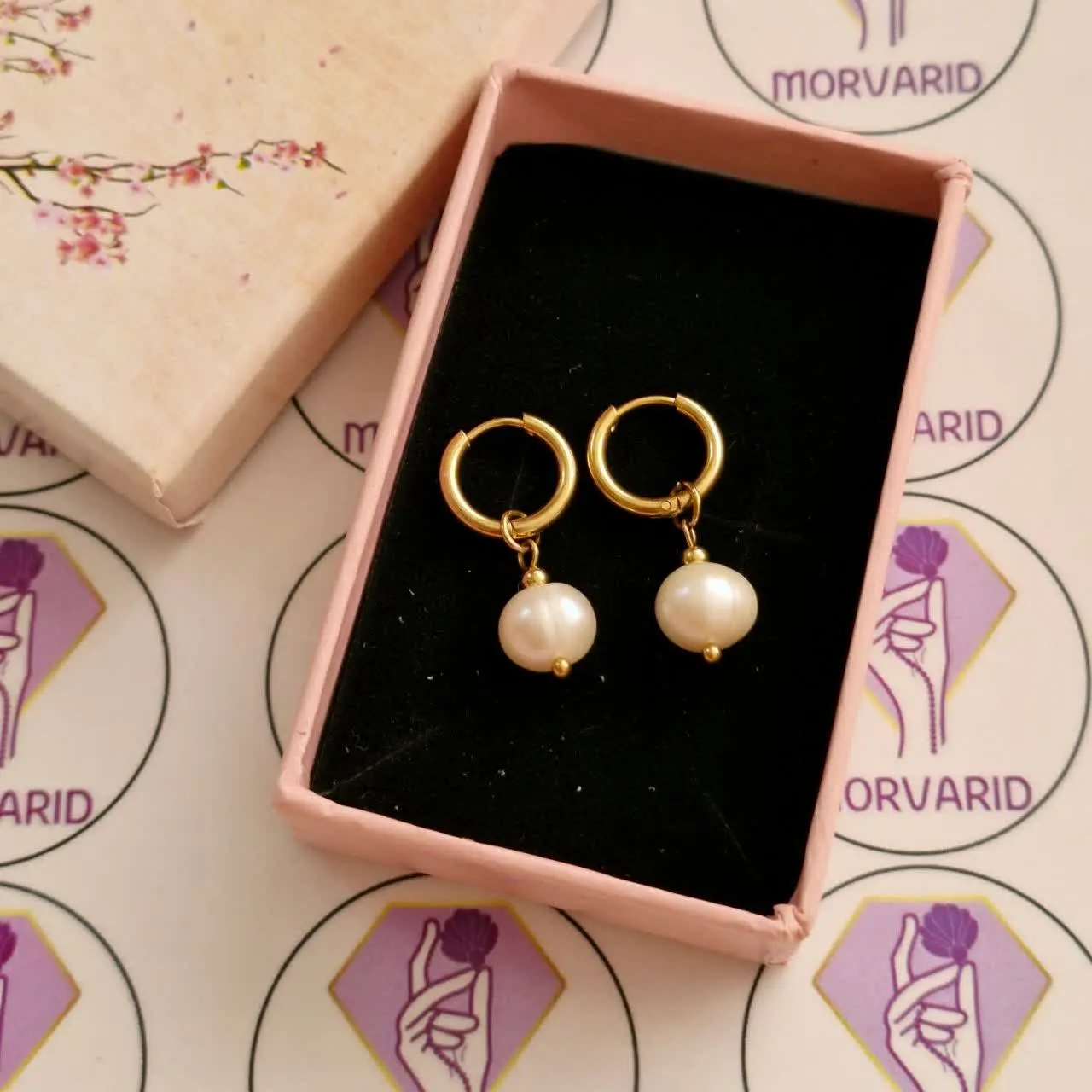 گوشواره تک مروارید مدل حلقه ای