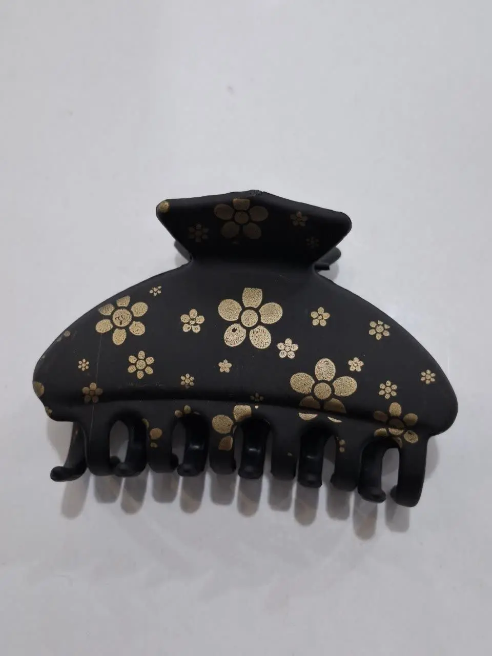 کلیپس مشکی طلاکوب
