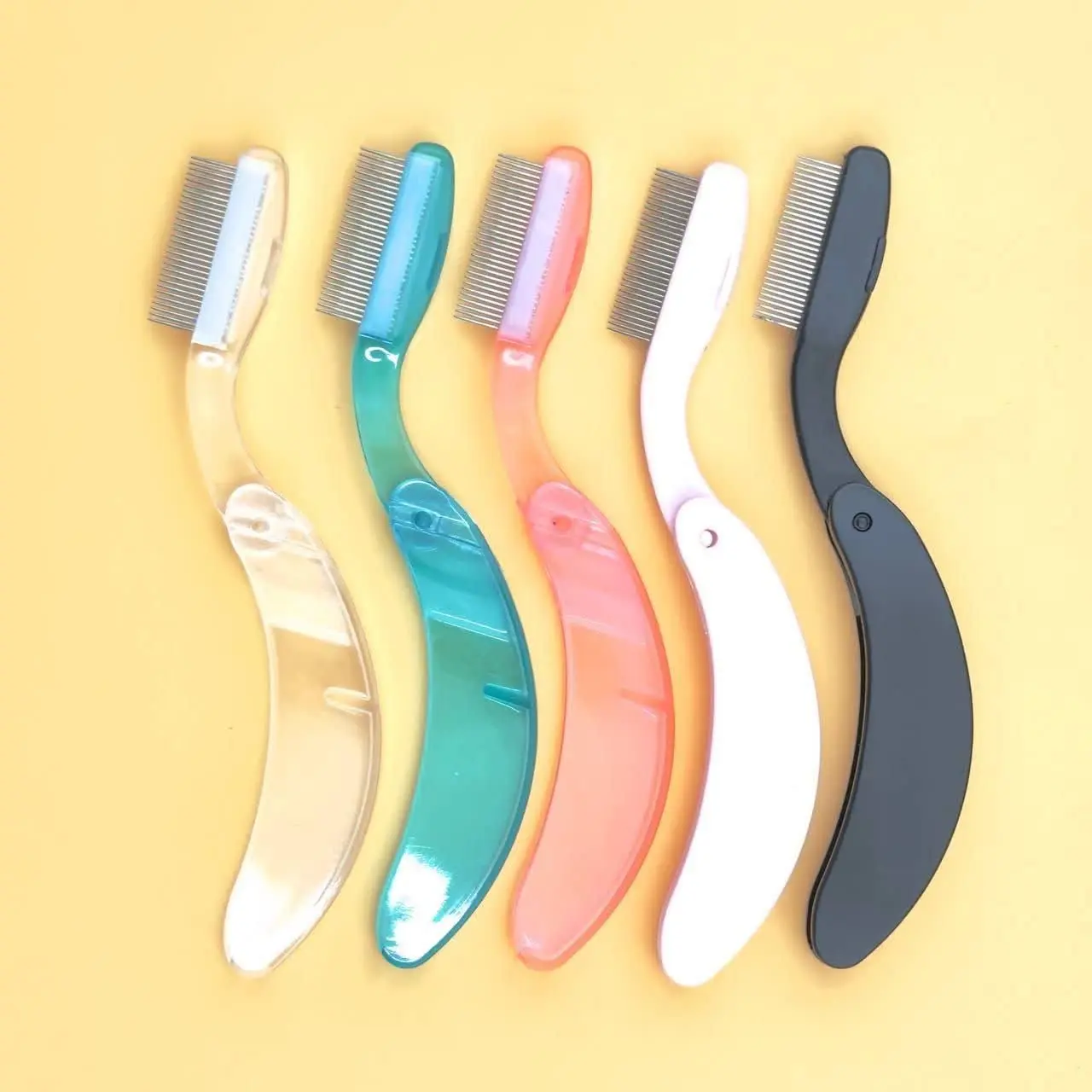 شانه مژه و ابرو فلزی تاشو