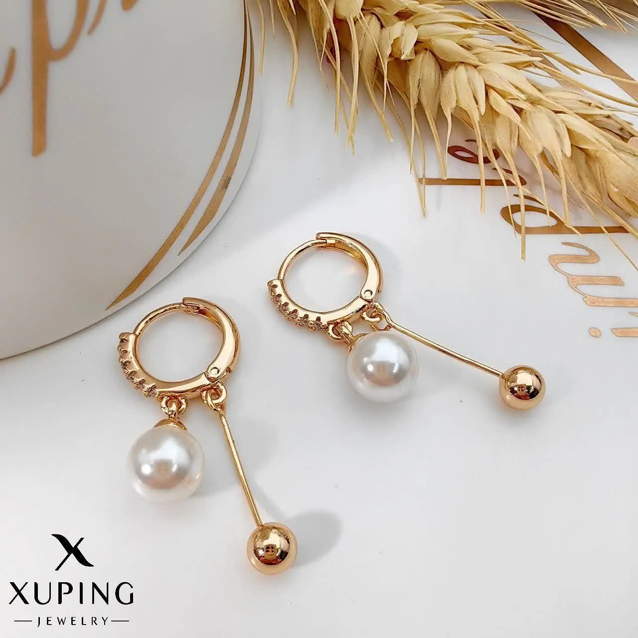 ⚜️ گوشواره آویز مروارید و گ...