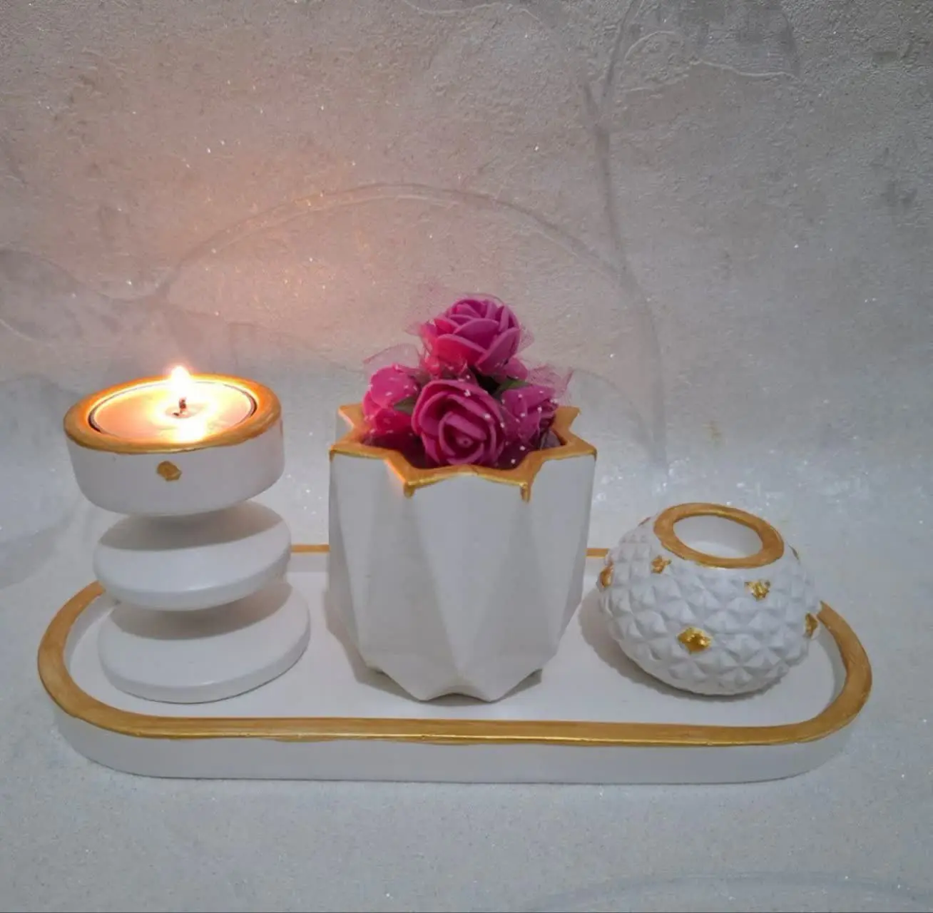 از این ست زیبا که شامل گلدان کوچیک جا شمعی و جا وارمری میشود
