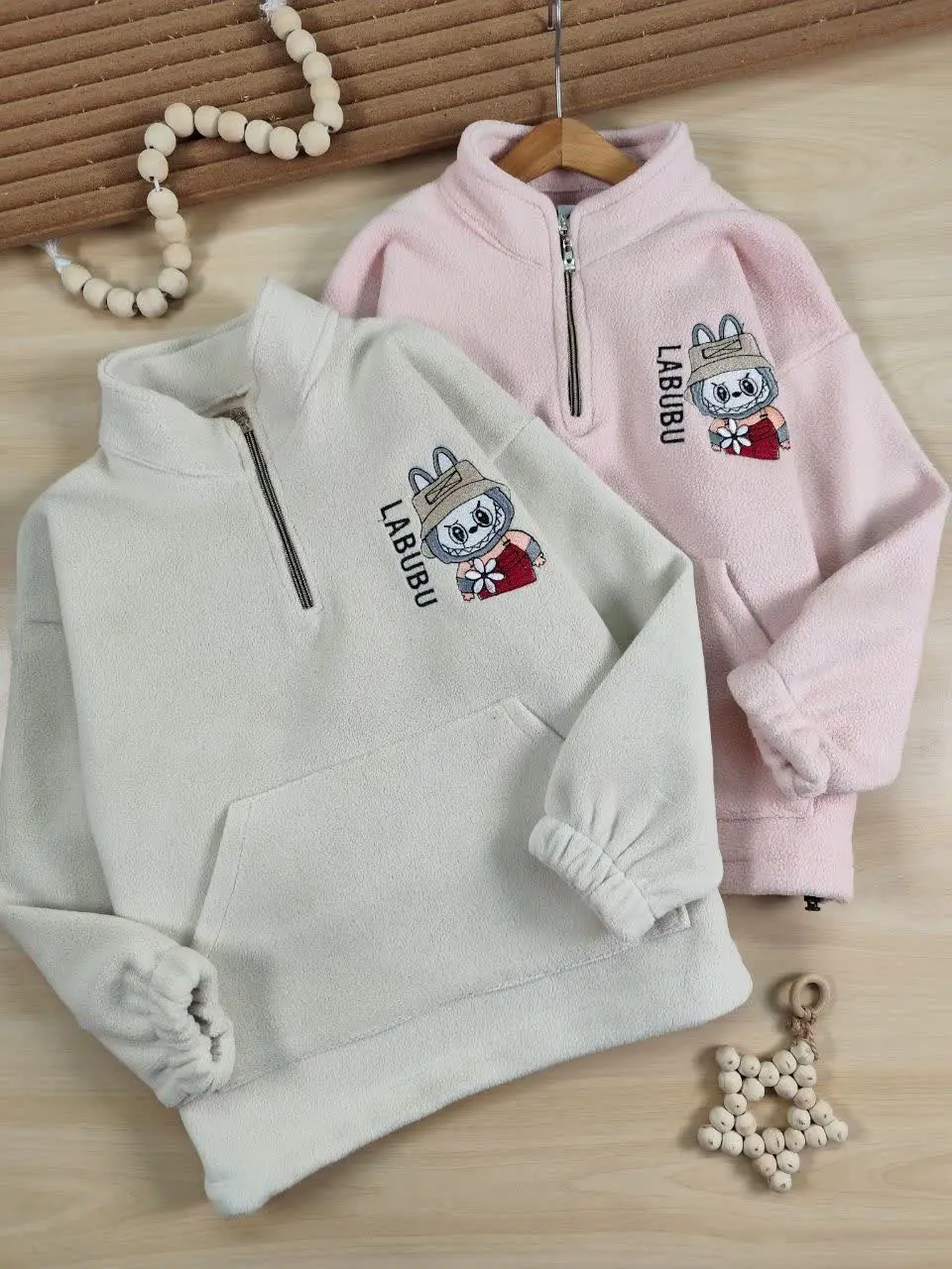 نیم زیپ فوتر لبوبو