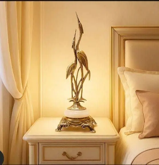 لک لک برنزی پایه سنگی مشکی...