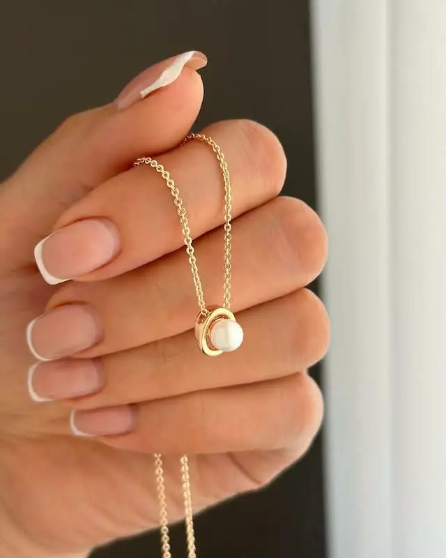 پلاک و زنجیر مرواریدی ژوپین...