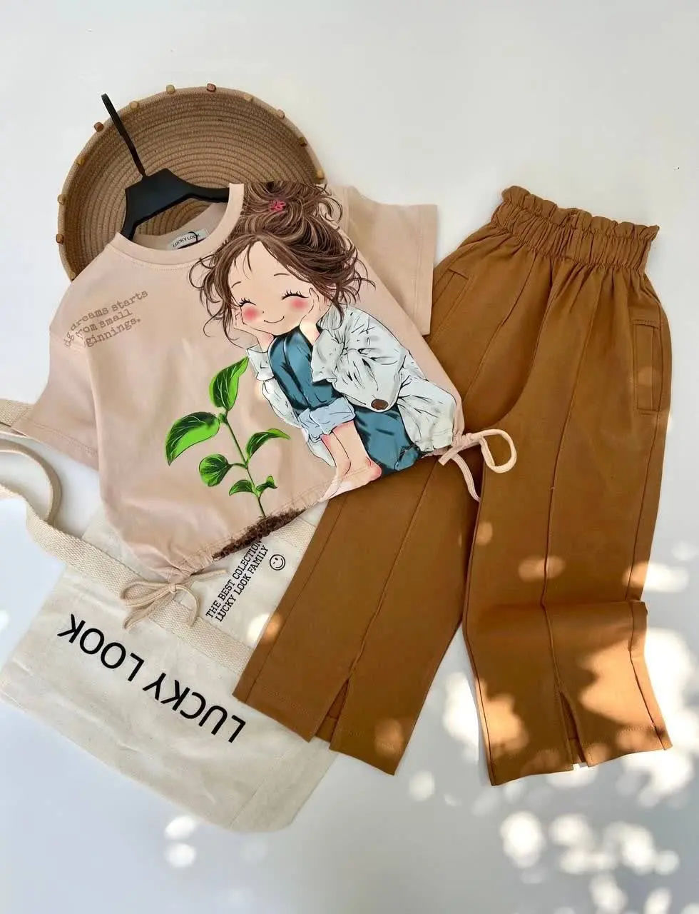 نام محصول: کراپ دخترانه دخترمهربون به همراه شلوار دورس بگ 
