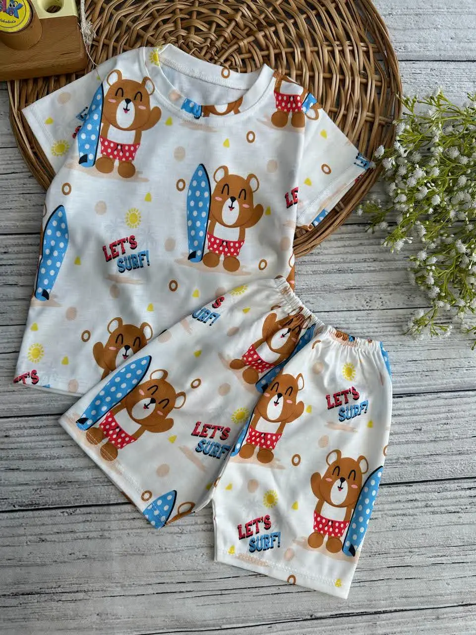 تیشرت شلوارک خرس موج سوار نوزادی و کودک کد ۱۱۱۰۱ 
