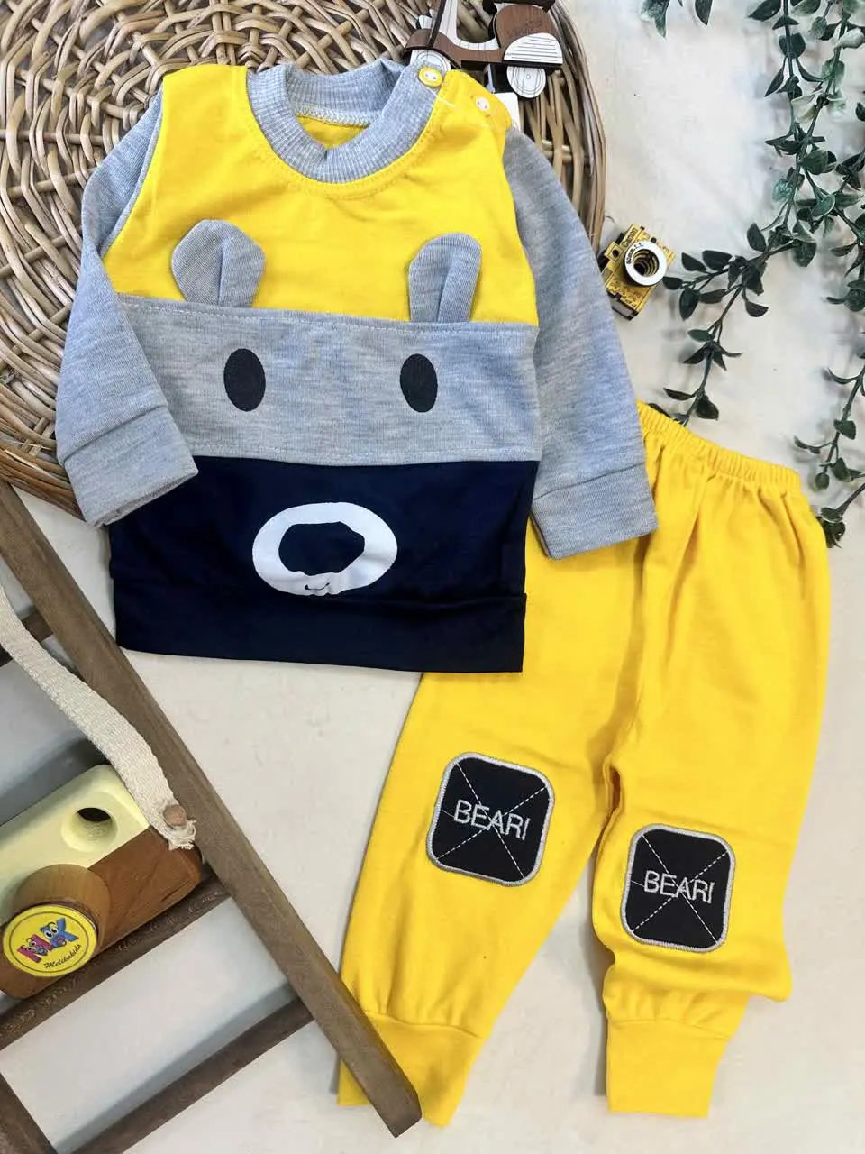بلوز شلوار گوشدار زرد نوزادی و کودک کد ۱۷۳۰۸۰ 
