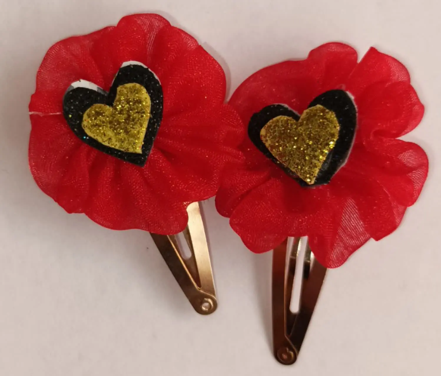 گل سر مدل پروانه وقلب جنس تور
