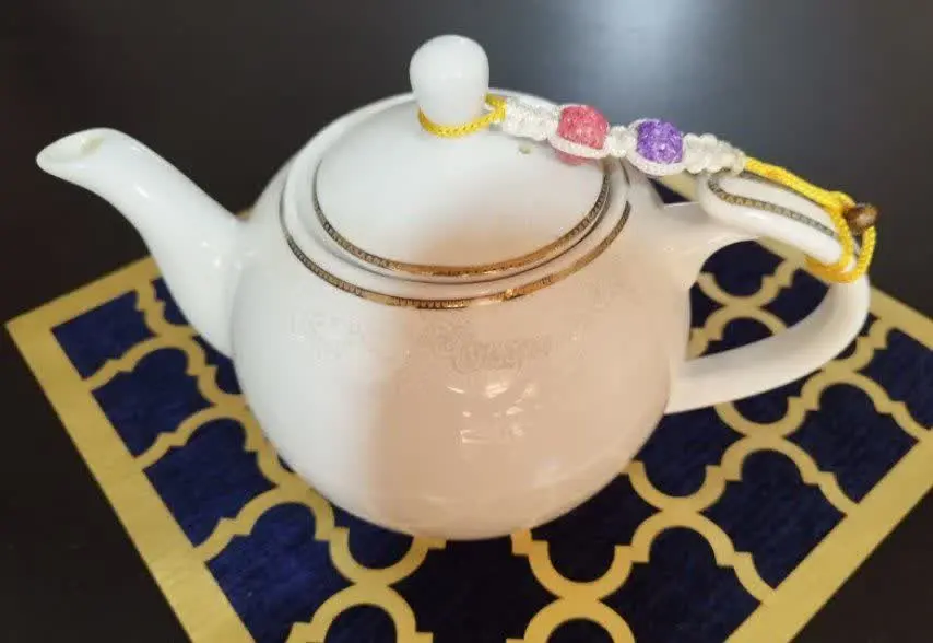 نگهدارنده درب قوری 
