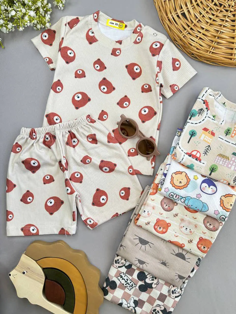 تیشرت شلوارک کبریتی طرح تدی نارنجی تمام چاپ نوزادی و کودک کد ۱۱۱۲۹ 
