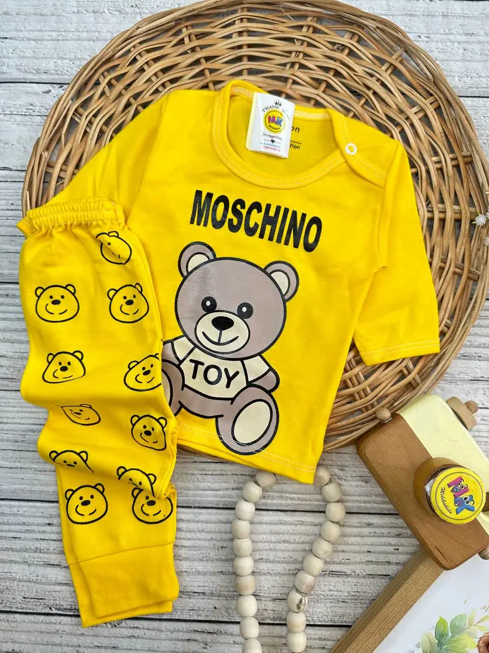 بلوز شلوار طرح موسچینو زرد نوزادی و کودک کد ۱۷۳۱۹۱ 
