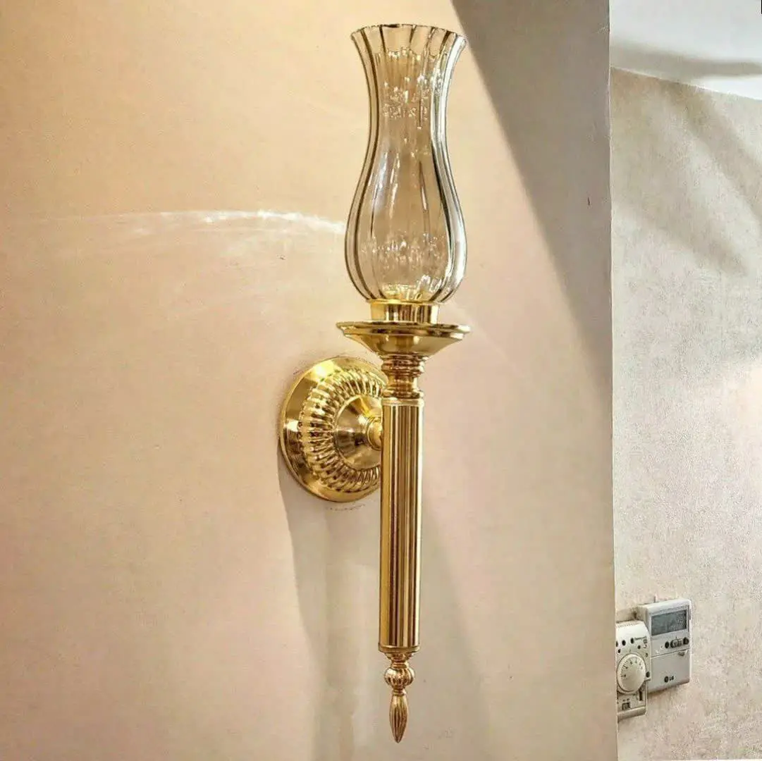 دیوارکوب تولید در سه رنگ طلایی نقره‌ای و آنتیک
