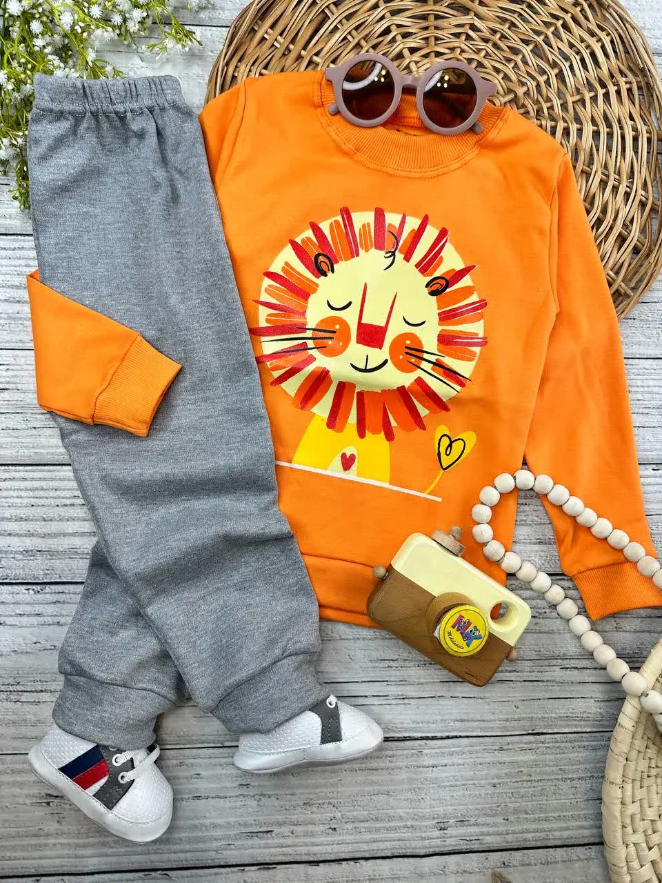 بلوز شلوار طرح شیر نارنجی نوزادی و کودک کد ۱۷۳۱۹۰ 
