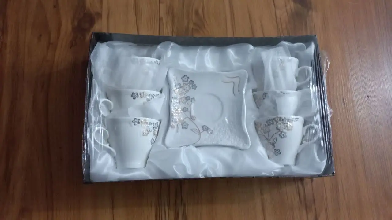 دوتا سرویس قهوه خوری گل برجسته 
