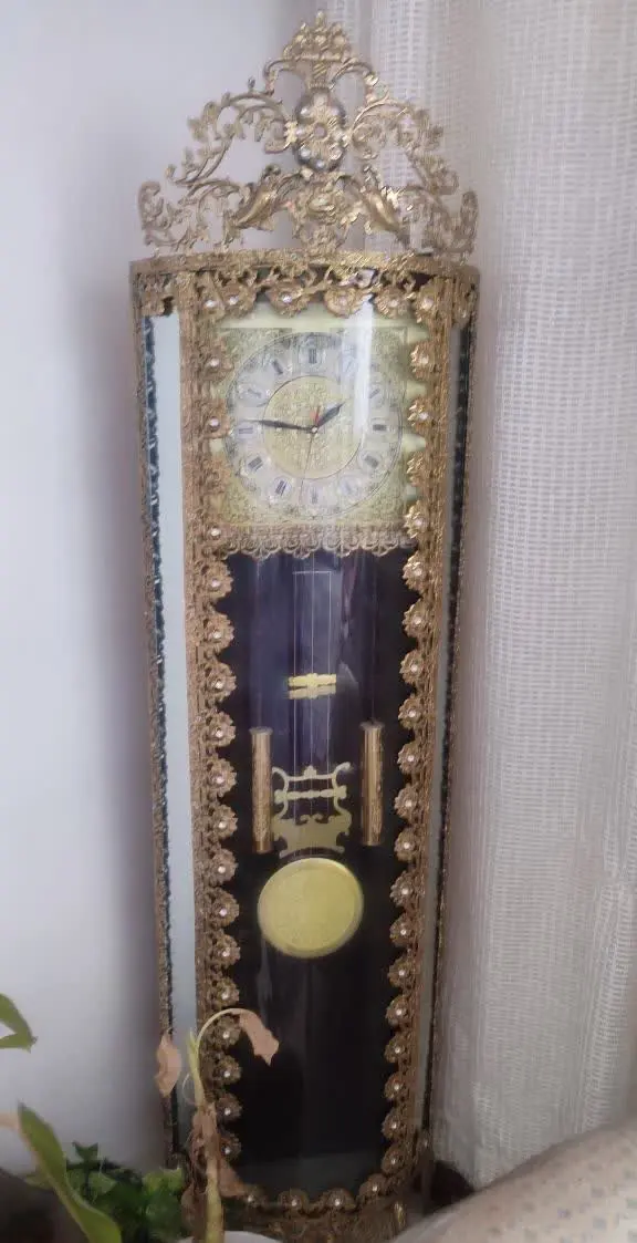 ساعت ایستاده برنجی