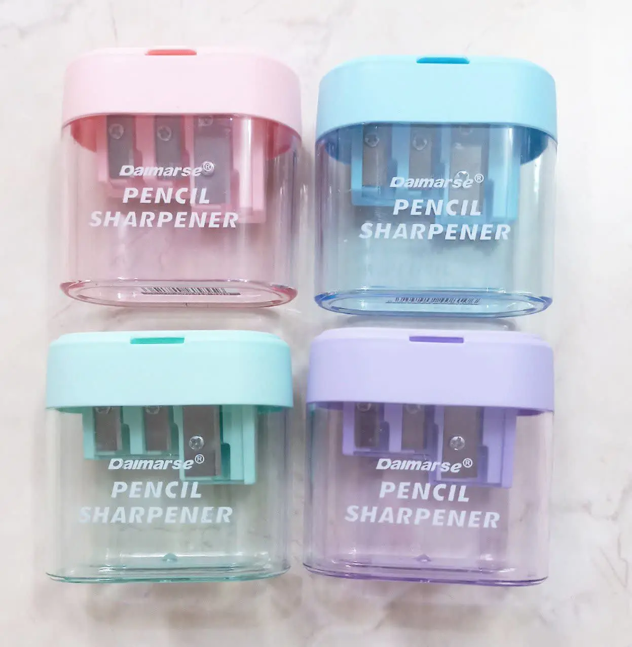 مدادتراش مخزن دار ۳تیغ پاستیلی
