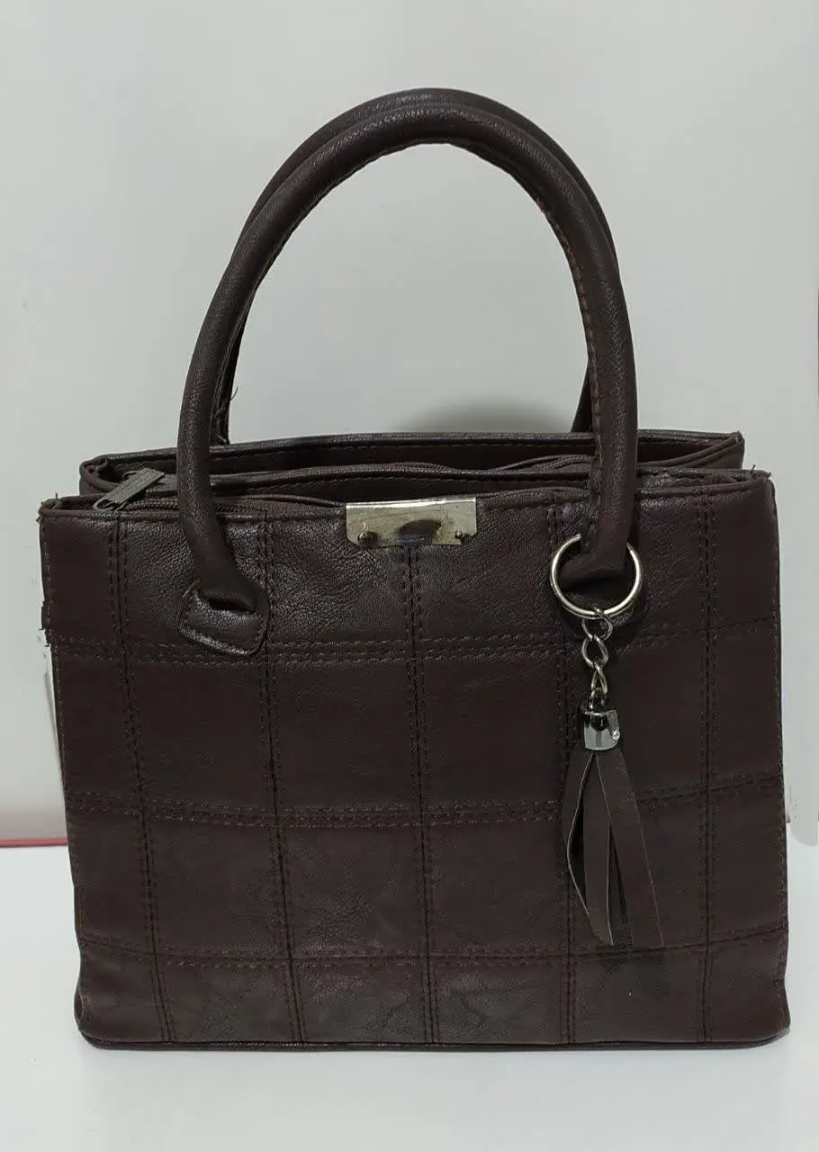 کیف زنانه چرم طرح تیکه دوزی