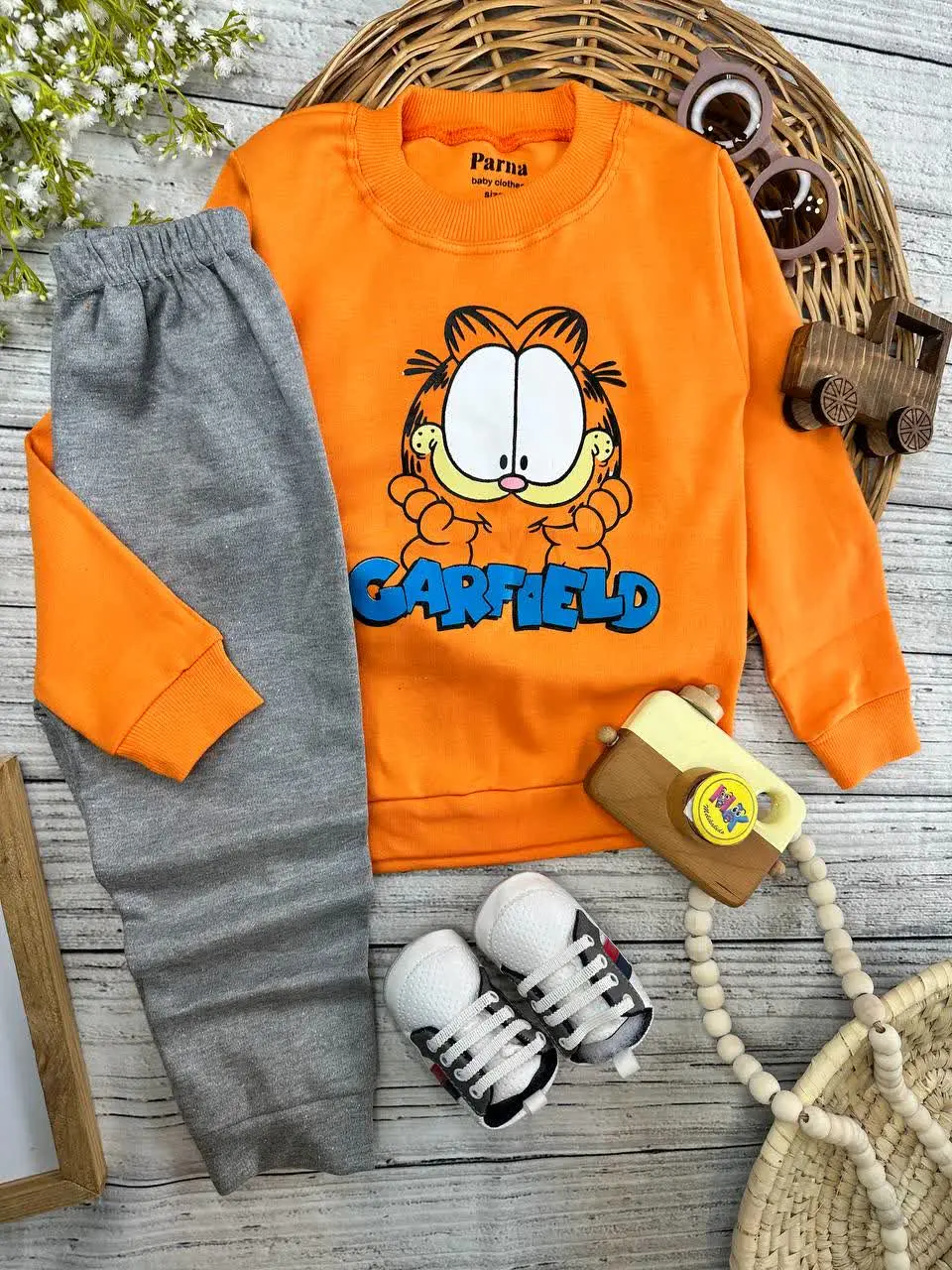 بلوز شلوار طرح گارفیلد نارنجی نوزادی و کودک کد ۱۷۳۱۸۷ 
