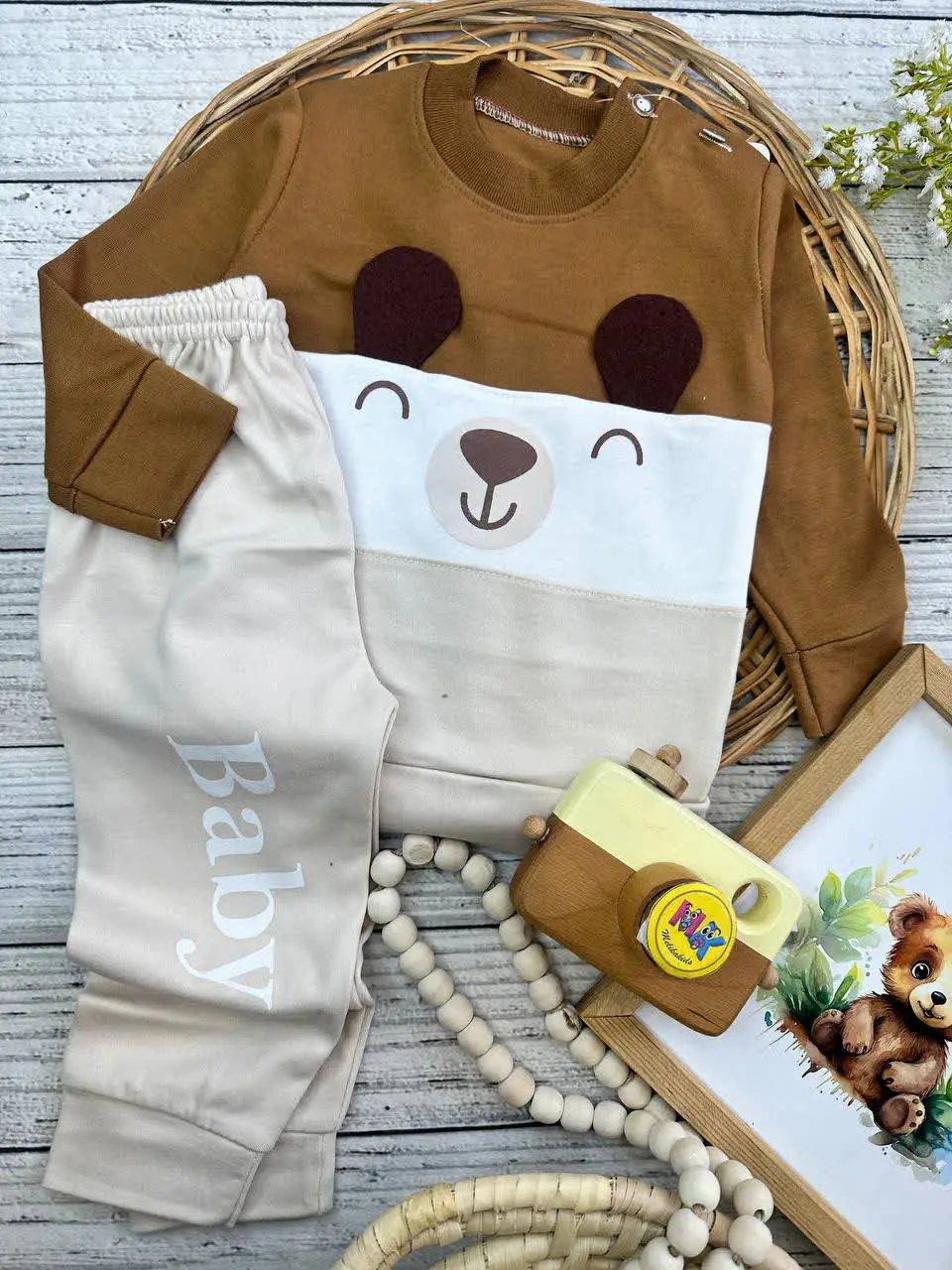 بلوز شلوار طرح هاپو گوش برجسته شکلاتی نسکافه‌ای نوزادی و کودک کد ۱۷۳۱۹۴ 
