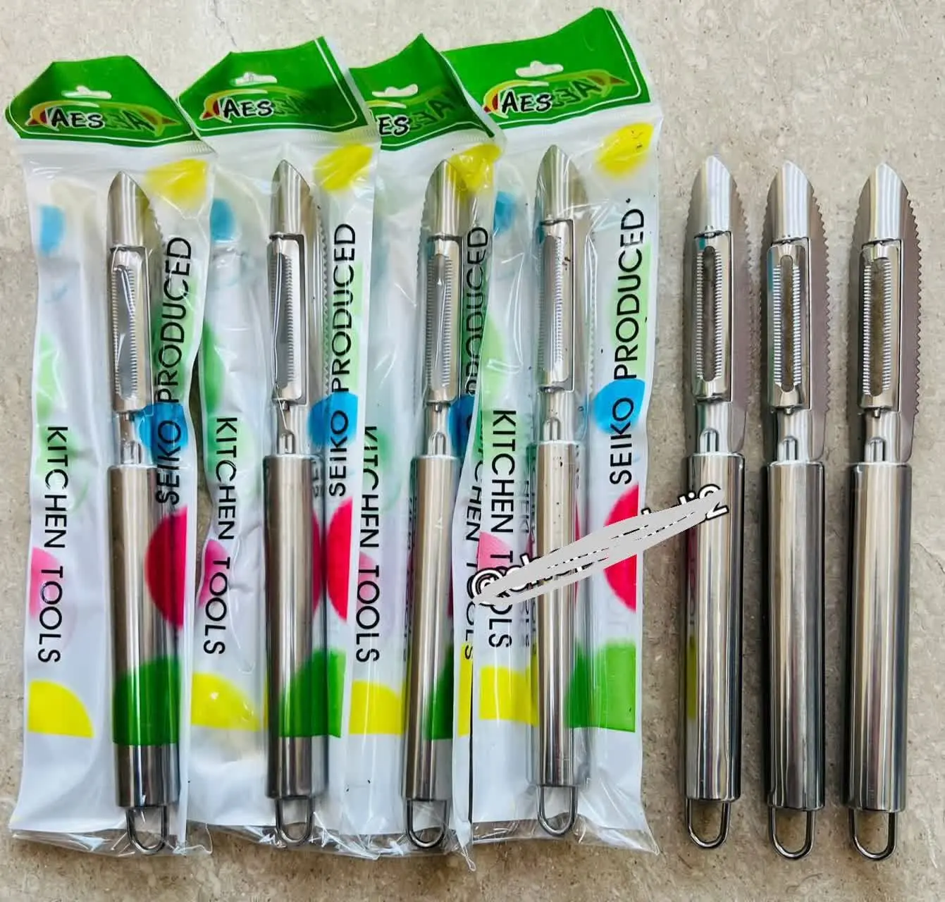 پوست کن مدادی استیل
