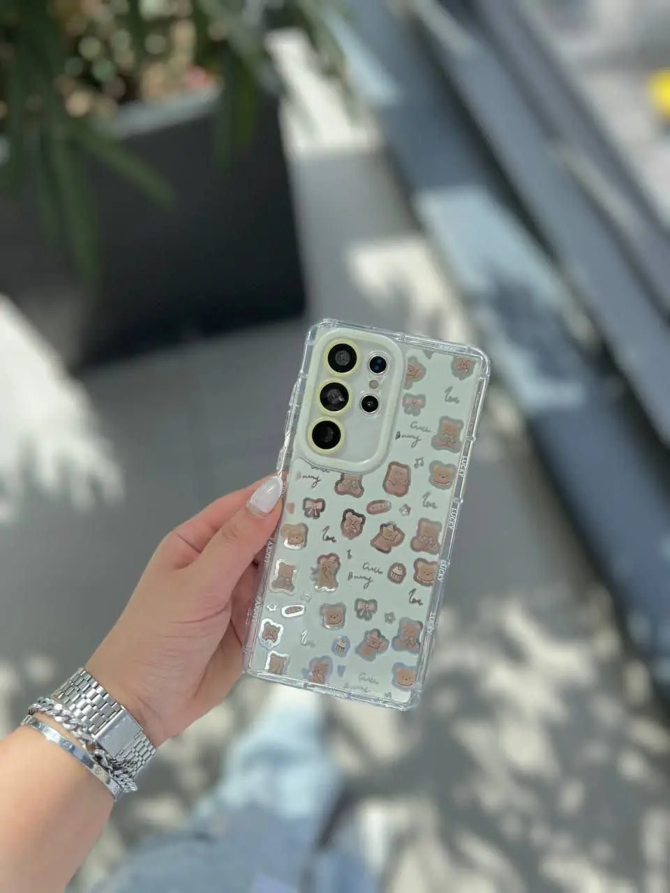 گارد تدی آیینه‌ای نشکن محافظ لنزدار | دکمه فلزی | جنس PC ضدضربه | دور ژله‌ای مناسب برای #آیفون، #سامسونگ، #شیائومی
